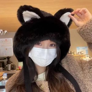 Winter plush cat ear trapper hat in black and white with warm chin straps for women