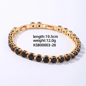 Detailed view of a gold tennis bracelet with black cubic zirconia and 19.5cm length info