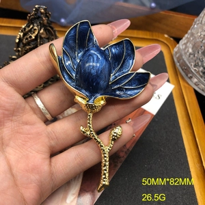 Detailed size view of the 50mm by 82mm blue enamel magnolia flower brooch with dimensions