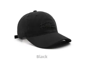 Close-up of black cotton baseball cap showing detailed 3D embroidered logo and neat stitching