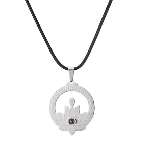Silver stainless steel hollow lotus pendant necklace with black cord on white background