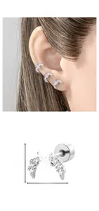 Detail view of crescent moon stud earring with pink stone and dimensions of 0.95cm