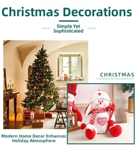 Detail of Christmas snowman plush doll with red knitted scarf and wooden ski poles