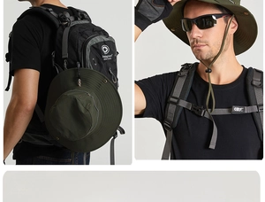 Détail d'un chapeau de soleil respirant vert armée à larges bords pour la randonnée