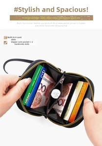 Detail view of small black leather wallet interior with card slots and coin pocket