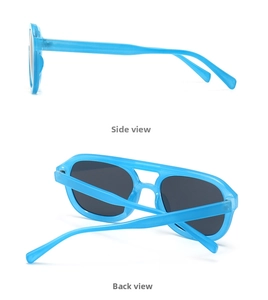 Detail view of translucent blue flat top aviator sunglasses with dark grey lenses