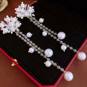 Elegant floral pearl tassel earrings with crystal beads and gold metal in a red gift box