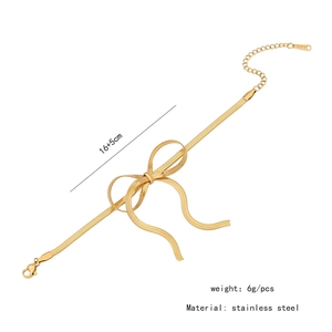 Detail view of a gold stainless steel bow bracelet with dimensions and 16+5cm size markers