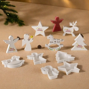 Christmas silicone molds featuring reindeer, rocking horse, and star shapes for DIY crafts