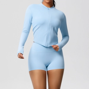 Detail view of light blue dual-sided brushed yoga set with zip jacket and slim shorts