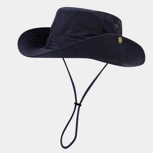 Detailed side view of navy blue outdoor sun hat featuring brass eyelets and adjustable cord