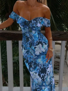 Close-up of floral print mesh fabric with ruffle neckline and blue floral pattern details