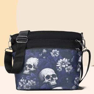 Gothic skull and purple floral print crossbody bag with multiple zip pockets and wide strap
