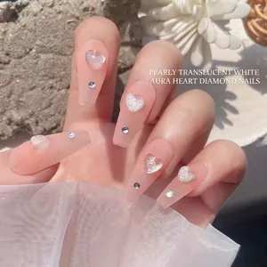 Long trapezoid press-on nails with iridescent heart crystals and pearly aurora finish