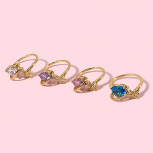 Saturn heart rings with zircon stones in 18k gold plating featuring four stylish colors