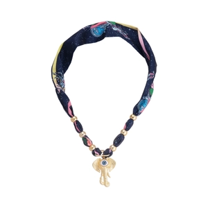 Bohemian elephant pendant necklace with blue silk star pattern and evil eye accent