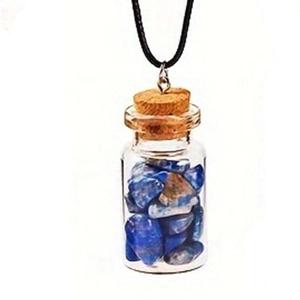 Detail of glass bottle pendant with blue crushed stones and black cord necklace