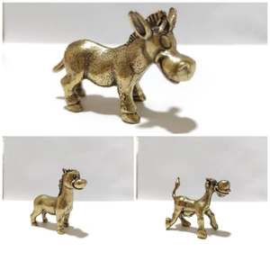 Detailed views of a vintage bronze cartoon donkey figurine made of durable metal alloy