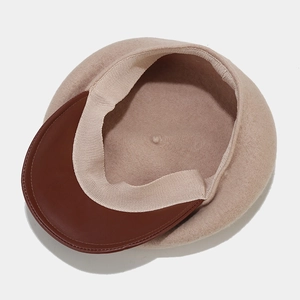 Chic beige wool felt beret with brown leather brim and comfortable inner sweatband