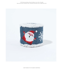 Detail of Christmas burlap ribbon with plush trim, blue color and snowflake pattern
