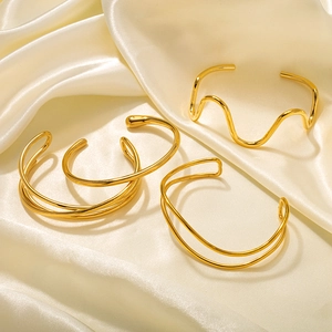 Minimalist 18k gold plated stainless steel layered wavy cuff bracelets set on silk