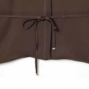 Coffee brown poplin shirt detail featuring stylish lace-up neck design and golden aglets