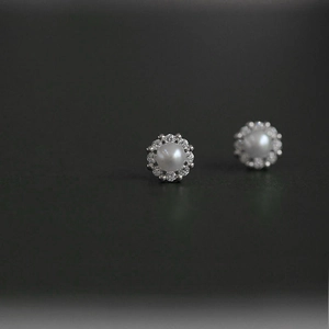 Elegant silver plated stud earrings with round white pearl and crystal halo detail