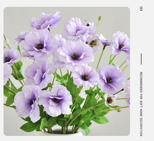 Detailed close-up of purple silk peony artificial flowers with realistic fabric petals