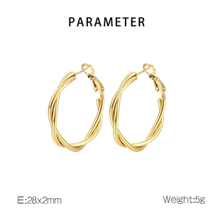 Detail view of 28mm twisted gold titanium steel hoop earrings with 5g weight specs