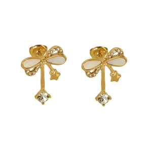 Golden bow earrings with white enamel wings and sparkling zircon crystal drop pendants