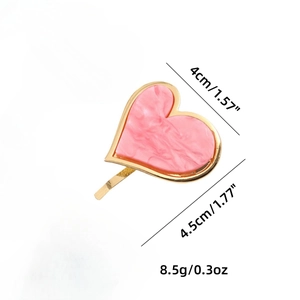 Pink heart ponytail hook with gold alloy frame and marble texture acetate finish