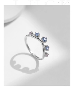 Detail of S925 sterling silver wave ring with five gradient colorful round gemstones