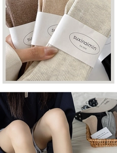 Close-up of earth-toned ribbed knit socks with detailed vertical texture and packaging