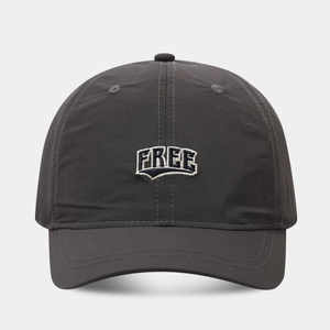 Detailed front view of dark grey baseball cap with white FREE 3D embroidery on crown