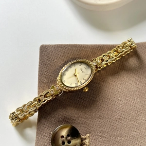 Montre À Quartz Pour Femme Cadran Ovale Chiffres Romains Bracelet À Chaîne Ajourée Alliage Vintage Élégant Luxe Étanche