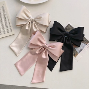 French style oversized satin bow hair clip set in cream, pink, and black colors