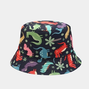 Detailed view of dark blue bucket hat with colorful cartoon dinosaur prints and fine stitching