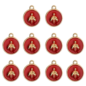 Golden bee pendants with red enamel finish for DIY jewelry making and craft projects
