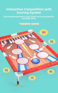 Detail view of the portable bean bag toss target board with score holes for kids' play