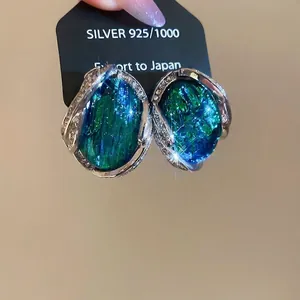 Élégantes boucles d'oreilles vintage en argent S925 avec résine bleue-verte et zircons