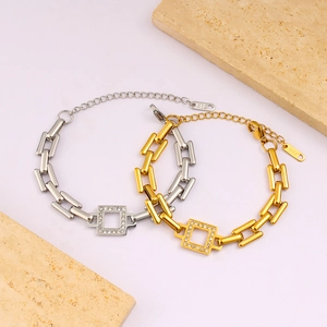 Detail showing 18K plated rectangular chain bracelets in gold and silver with zircon squares