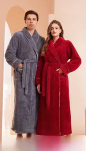 Detailed texture of thick plush bathrobe with large lapel and cozy fleece pockets