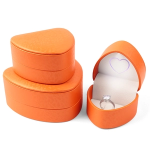 Orange heart-shaped jewelry box with LED light and litchi texture for rings