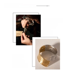 Detail of two-tone hammered texture ring with 18K gold vacuum plating and hand polishing