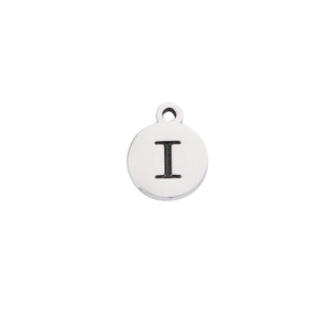 Close-up of a silver stainless steel round pendant featuring an engraved letter I