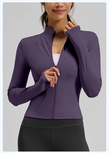 Close-up of slim-fit purple sports jacket featuring full zipper and thumbhole sleeves
