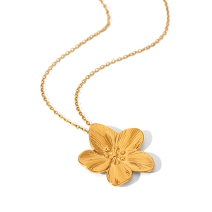 Detailed view of a 18K gold-plated floral pendant necklace with intricate petal textures