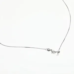 Close-up of adjustable S925 sterling silver box chain with lobster clasp and sliding bead