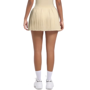 Back view of beige pleated tennis skirt with high waist design and elastic sports fabric