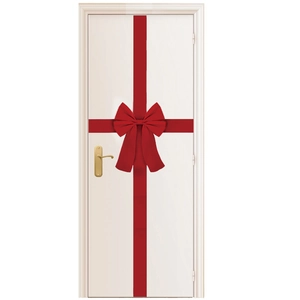 Large red ribbon bow for Christmas door decoration with satin finish and vertical straps